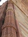 A beautiful carved pillar of the Qutab complex located in Delhi, India. The Qutab complex is a very popular tourist destination in India. Carved Pillar