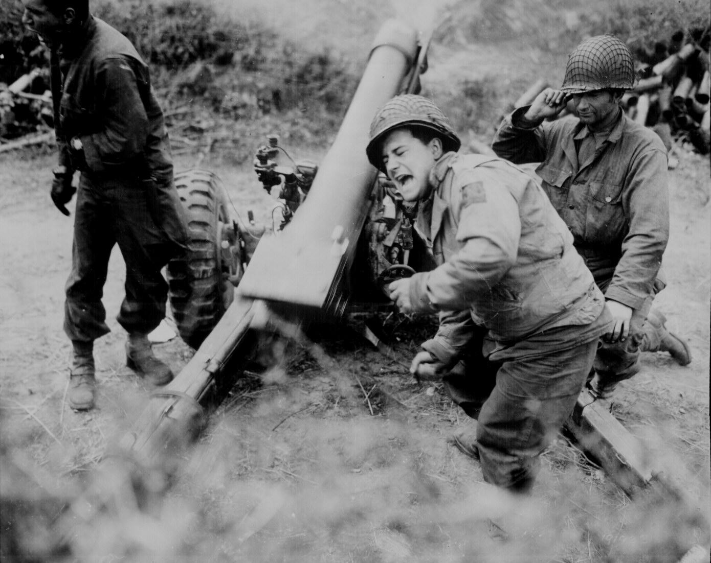 American Howitzer in Action During World War II