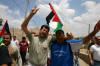 Adeeb & Phil participate in a protest against the Israeli settlements. 