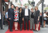 John Cusack poses with family and friends. (April 24, 2012)