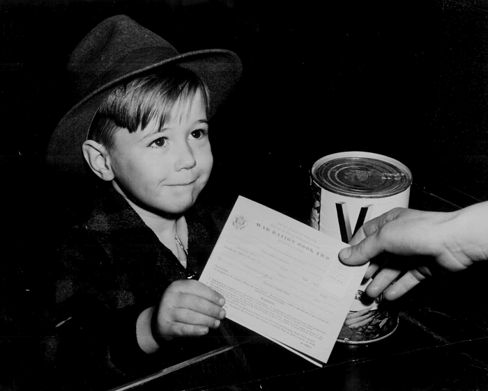 Boy with World War II Ration Book