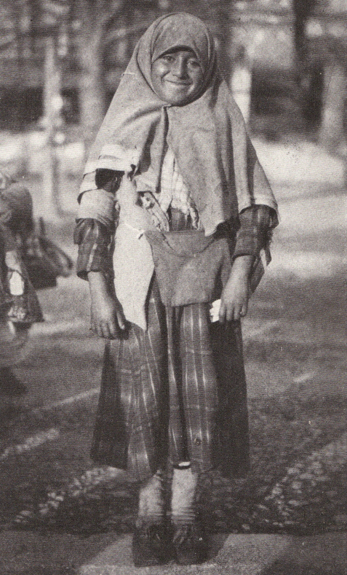 A Young Girl Begging for Alms